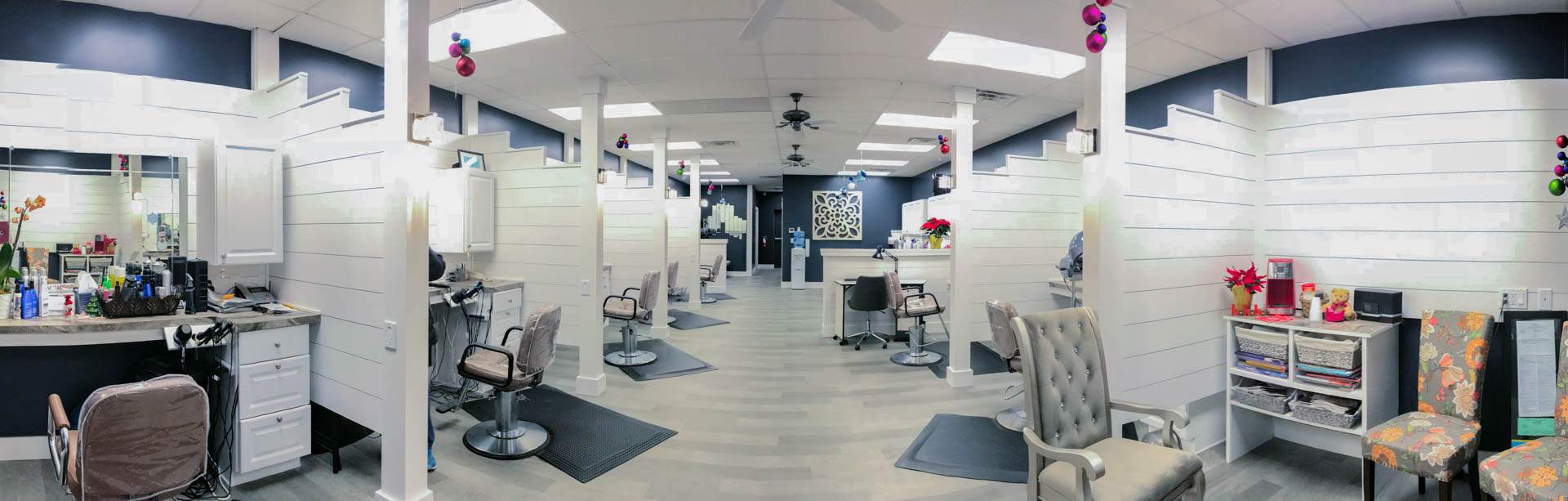 panoramic view of the inside of First Class Hair